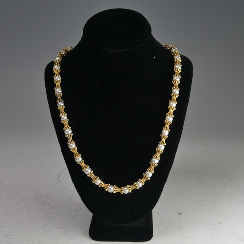 314 - A 9ct yellow gold and cultured pearl Necklace, the integral barrel snap with London import marks for... 