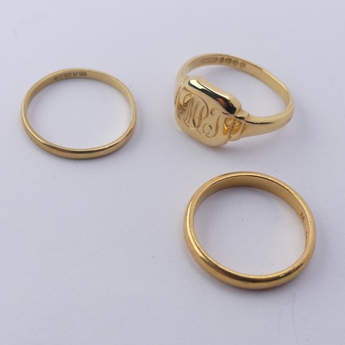 277 - A narrow 22ct yellow gold Band, Size Q, 4.2g together with an 18ct gold signet ring, engraved with i... 