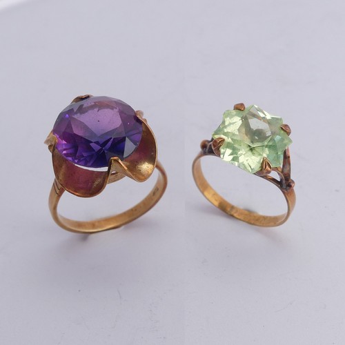 280 - A synthetic sapphire Ring, the colour change circular facetted stone approx. 13.75mm diameter, mount... 