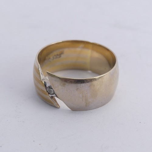 281 - A 14ct gold Band, the abstract split front with single white paste, Size N, 6.8g.