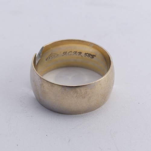 281 - A 14ct gold Band, the abstract split front with single white paste, Size N, 6.8g.