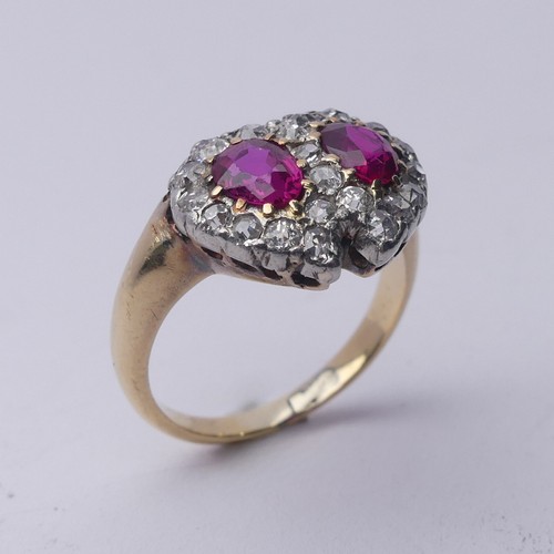 288 - A late Victorian ruby and diamond cluster Ring, formed as two entwined hearts, central pear shaped r... 