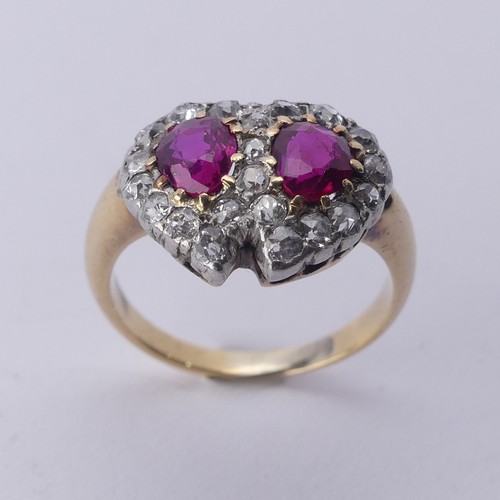 288 - A late Victorian ruby and diamond cluster Ring, formed as two entwined hearts, central pear shaped r... 