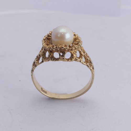 289 - A small cultured pearl Ring, in 9ct gold textured pierced mount, Size M, 2.3g.