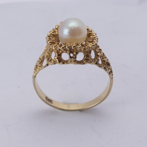 289 - A small cultured pearl Ring, in 9ct gold textured pierced mount, Size M, 2.3g.