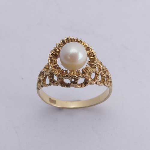 289 - A small cultured pearl Ring, in 9ct gold textured pierced mount, Size M, 2.3g.