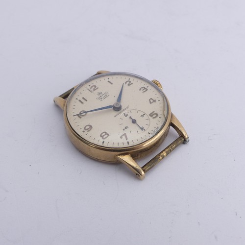 215 - Railwayana; A 9ct gold Smiths De Luxe Wristwatch, champagne dial with Arabic Numerals, subsidiary se... 