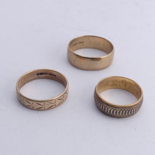 291 - A 9ct two colour gold Band, with geometric decoration, 6.9mm wide, Size P, together with a 9ct gold ... 