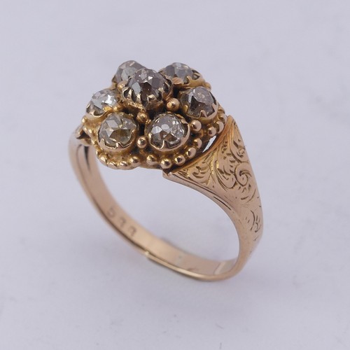 293 - A late Victorian diamond cluster Ring, the old cut stones all mounted in unmarked yellow gold, with ... 