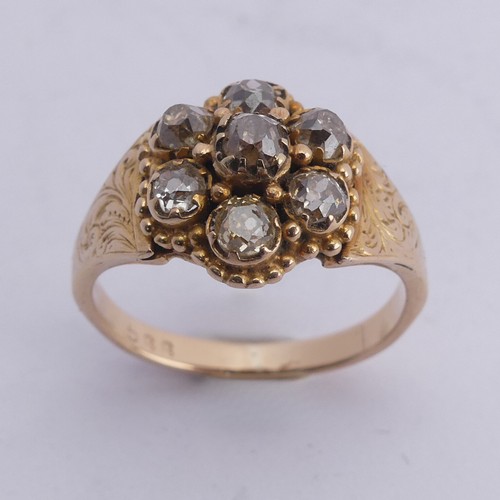 293 - A late Victorian diamond cluster Ring, the old cut stones all mounted in unmarked yellow gold, with ... 