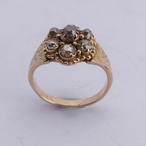 293 - A late Victorian diamond cluster Ring, the old cut stones all mounted in unmarked yellow gold, with ... 