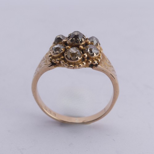 293 - A late Victorian diamond cluster Ring, the old cut stones all mounted in unmarked yellow gold, with ... 