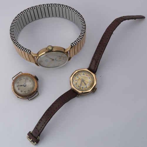 217 - A vintage Smiths De Luxe 9ct gold Wristwatch, the silvered dial with gilt Arabic Numerals and subsid... 