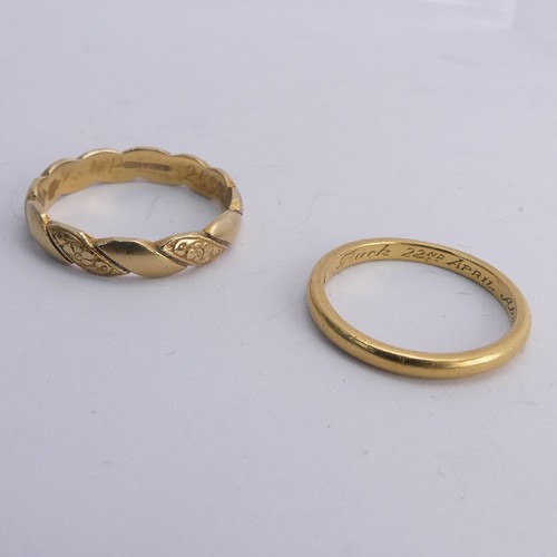 294 - An 18ct yellow gold Band, with alternate plain and foliate sections, Size P, 3.6g, together with a n... 