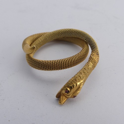 248 - A 9ct gold mesh Ring, forming a coiled snake, with ruby glass eyes, 3.6g.