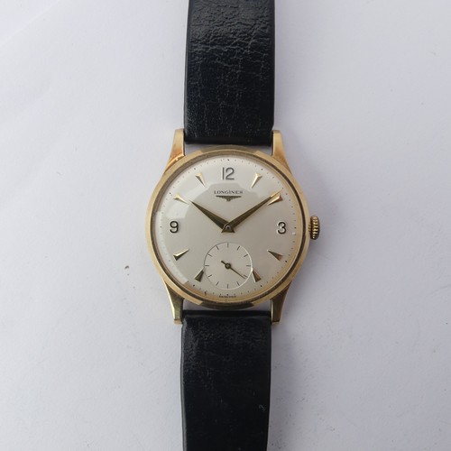 218 - A 9ct gold Longines Wristwatch, the silvered dial with gilt baton hour makers and Arabic numeral qua... 