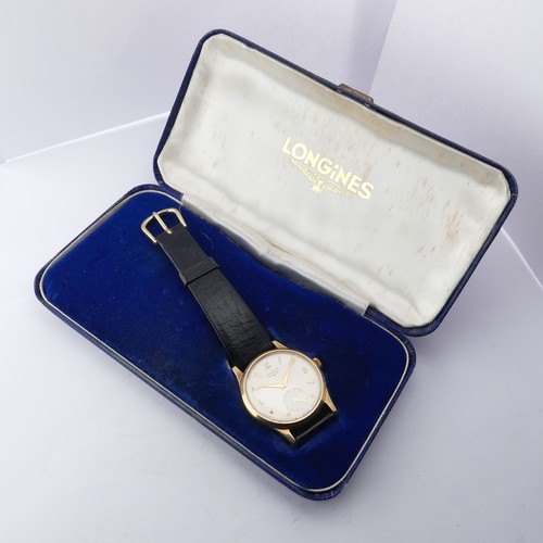 218 - A 9ct gold Longines Wristwatch, the silvered dial with gilt baton hour makers and Arabic numeral qua... 