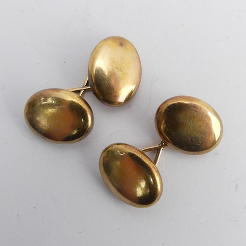 377 - A pair of 15ct yellow gold oval cufflinks, 4.6g.