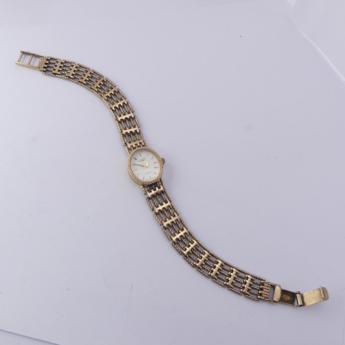 219 - A 9ct gold lady's Rotary Wristwatch, with quartz movement, on a 9ct gold bracelet strap, gross total... 