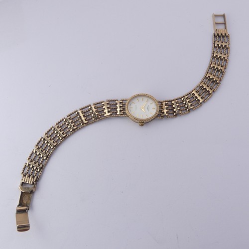 219 - A 9ct gold lady's Rotary Wristwatch, with quartz movement, on a 9ct gold bracelet strap, gross total... 