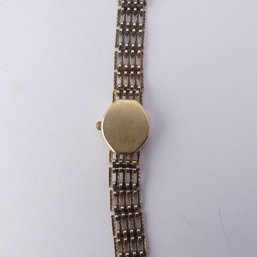 219 - A 9ct gold lady's Rotary Wristwatch, with quartz movement, on a 9ct gold bracelet strap, gross total... 