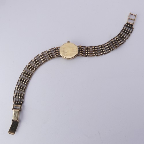 219 - A 9ct gold lady's Rotary Wristwatch, with quartz movement, on a 9ct gold bracelet strap, gross total... 