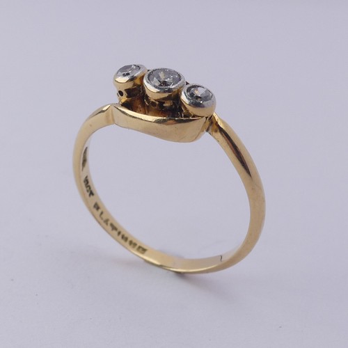 251 - A small three stone diamond Ring, millegrain set on the cross in 18ct yellow gold and platinum, Size... 