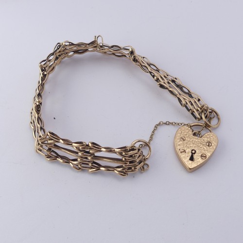 321 - A 9ct yellow gold gatelink Bracelet, with textured 9ct gold padlock clasp, approx. total weight 14.7... 