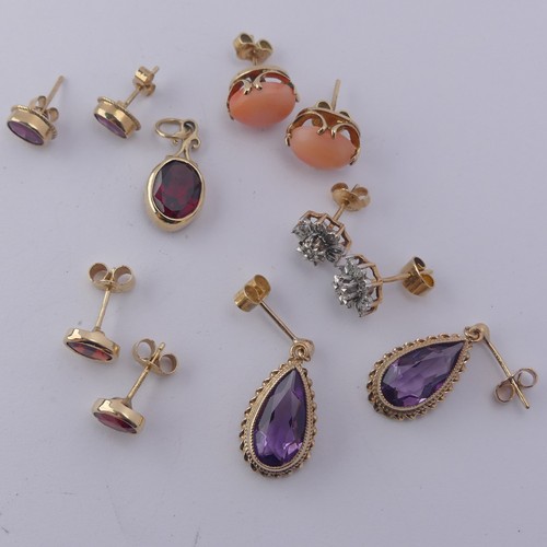 340 - A pair of 9ct gold and amethyst Earrings, the pear shaped stones in ropetwist mount, the drops 19m, ... 