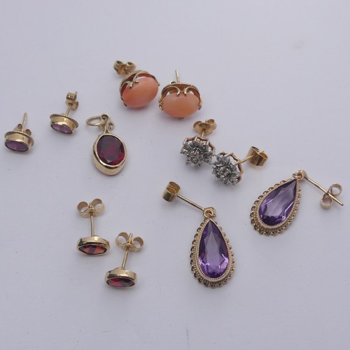 340 - A pair of 9ct gold and amethyst Earrings, the pear shaped stones in ropetwist mount, the drops 19m, ... 