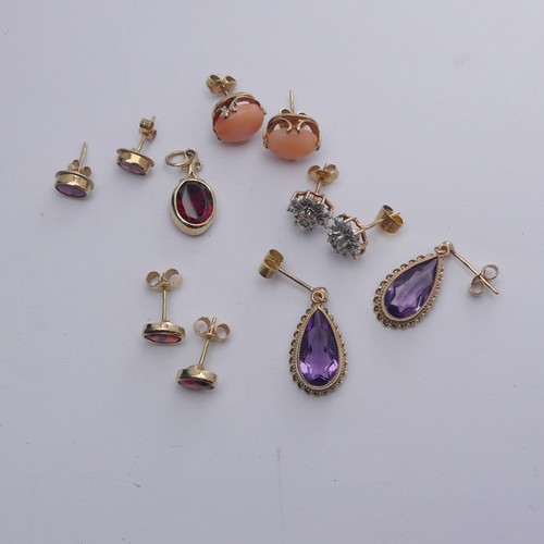 340 - A pair of 9ct gold and amethyst Earrings, the pear shaped stones in ropetwist mount, the drops 19m, ... 