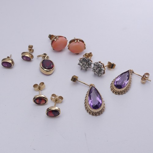 340 - A pair of 9ct gold and amethyst Earrings, the pear shaped stones in ropetwist mount, the drops 19m, ... 