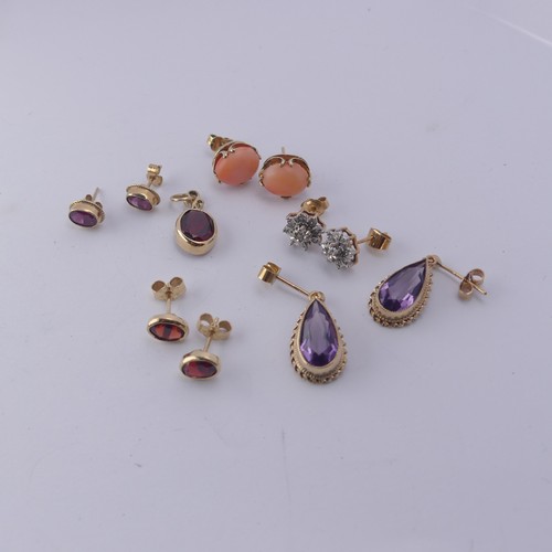 340 - A pair of 9ct gold and amethyst Earrings, the pear shaped stones in ropetwist mount, the drops 19m, ... 