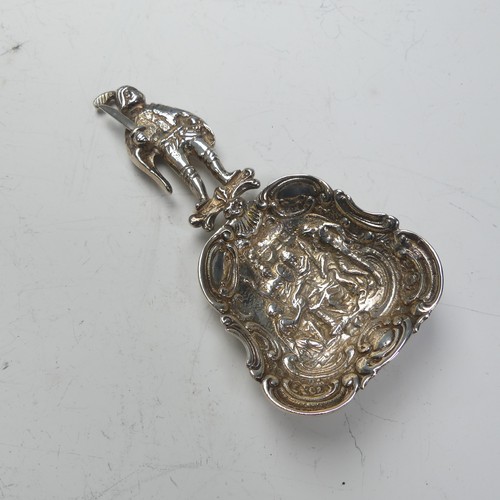 83 - An Edwardian silver Caddy Spoon, by James Dudley, hallmarked London, 1906, the bowl with figural sce... 