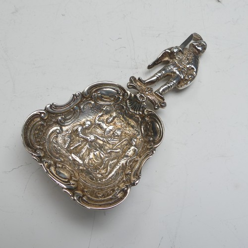 83 - An Edwardian silver Caddy Spoon, by James Dudley, hallmarked London, 1906, the bowl with figural sce... 