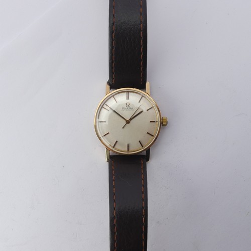 220 - A 9ct gold Omega Automatic Wristwatch, silvered dial with gilt hands and baton markers, Cal. 552 24-... 