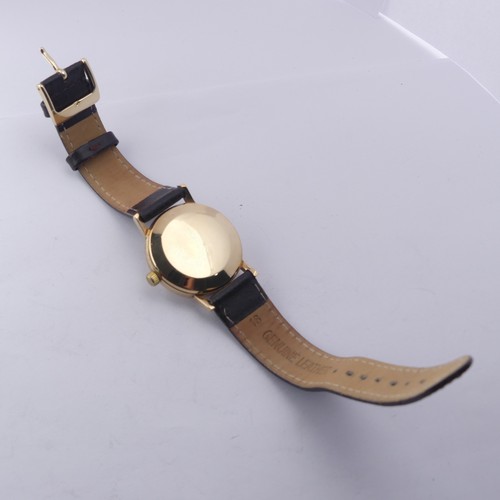 220 - A 9ct gold Omega Automatic Wristwatch, silvered dial with gilt hands and baton markers, Cal. 552 24-... 