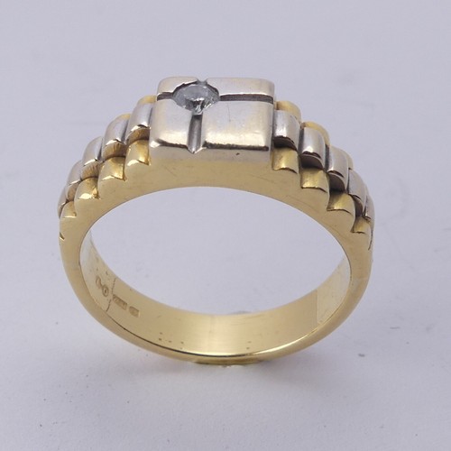 253 - An 18ct yellow and white gold Ring, the squared front set with a small diamond point, with stepped s... 