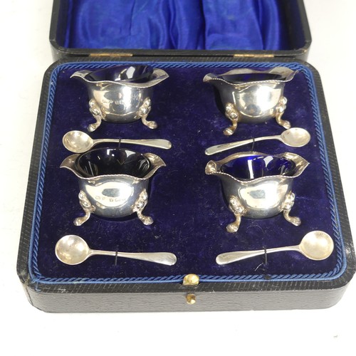 89 - A cased set of four silver Open Salts, by Joseph Gloster Ltd., hallmarked Birmingham, 1917, with blu... 