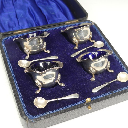 89 - A cased set of four silver Open Salts, by Joseph Gloster Ltd., hallmarked Birmingham, 1917, with blu... 