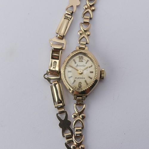 224 - A 9ct gold lady's Wristwatch, on 9ct bracelet strap, gross total weight 9.1g.