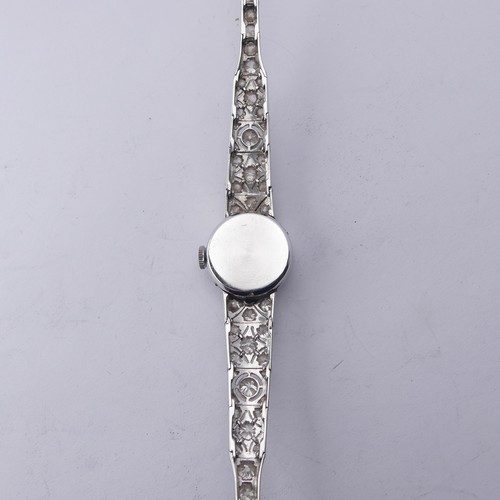 225 - A 9ct white gold and diamond Cocktail Watch, the silvered dial signed Verity, with a Swiss 17-jewels... 