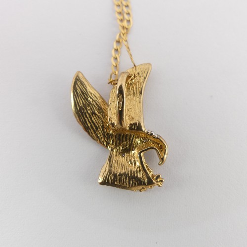 302 - A 9ct yellow and white gold Eagle Pendant, the body set with diamond points, 2.3cm long, on a 9ct go... 