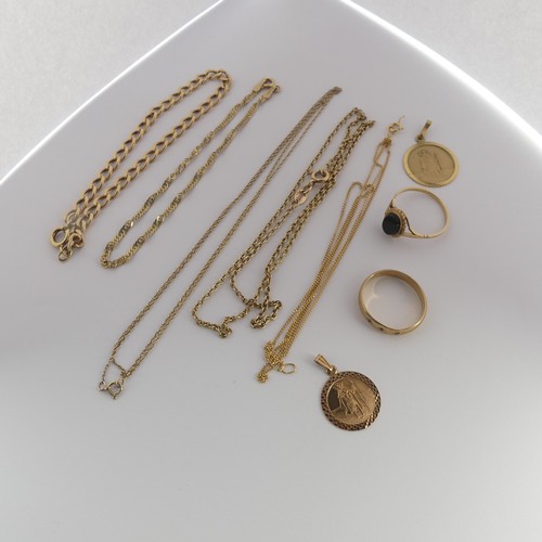 389 - A quantity of small 9ct gold Ear Studs, together with two 9ct gold St. Christopher pendants, a small... 