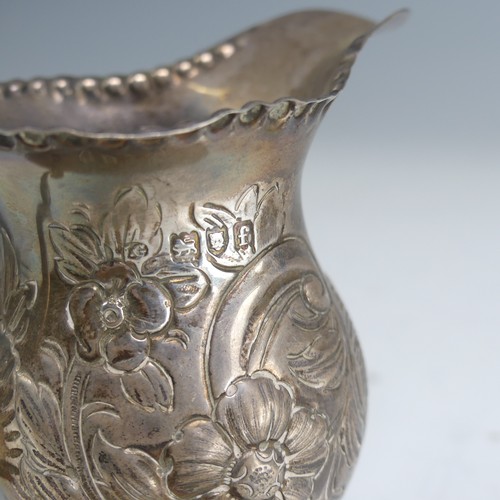 104 - A George V silver Cream Jug, by Atkin Brothers, hallmarked Sheffield, 1913, of circular form with sh... 