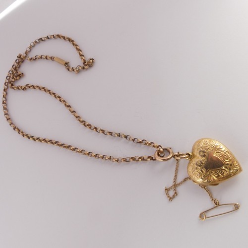 303 - An Edwardian 15ct gold heart shaped Pendant Locket, hallmarked Chester, 1908, the front with foliate... 