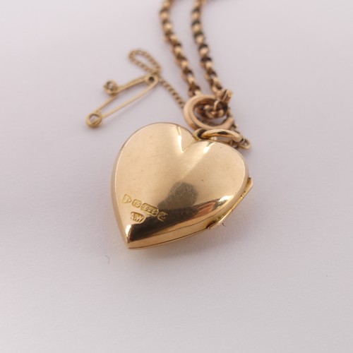 303 - An Edwardian 15ct gold heart shaped Pendant Locket, hallmarked Chester, 1908, the front with foliate... 