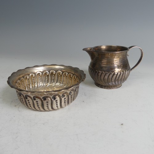 108 - A Victorian circular silver Bowl, by George Unite & Sons, hallmarked London 1890, with wavy rim ... 