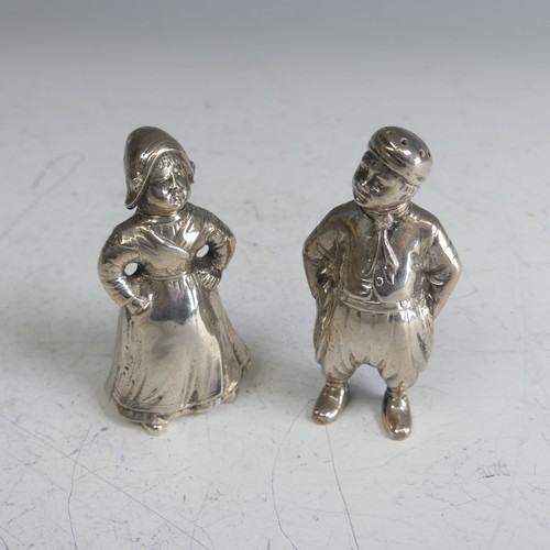 113 - Two Dutch silver novelty Figural Cruets, the lady in full dress with hinged head and pierced bonnet,... 