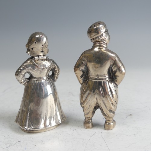 113 - Two Dutch silver novelty Figural Cruets, the lady in full dress with hinged head and pierced bonnet,... 